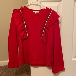 Red bell sleeve top with ruffle detail